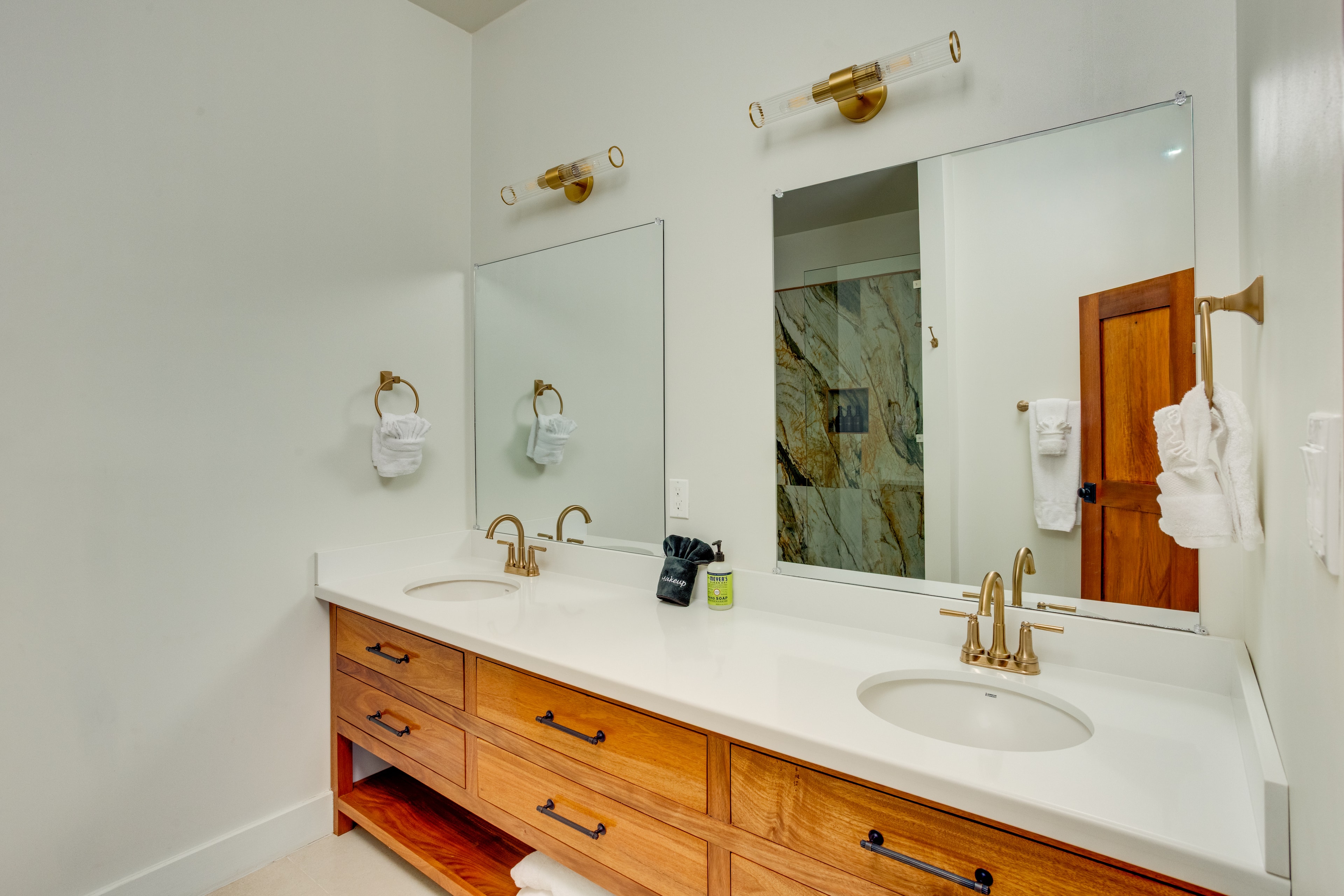 Master Suite Upstairs double vanity with gold fixtures